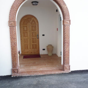 arched portal with plaited decoration - Ref. 065